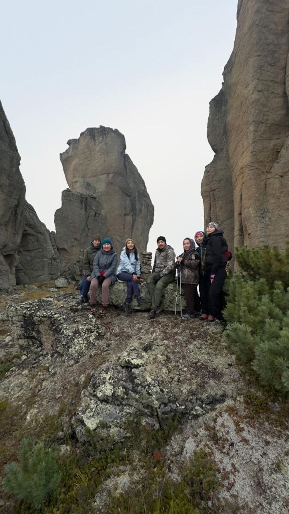 Group hiking through the Kisilyakh Mountains